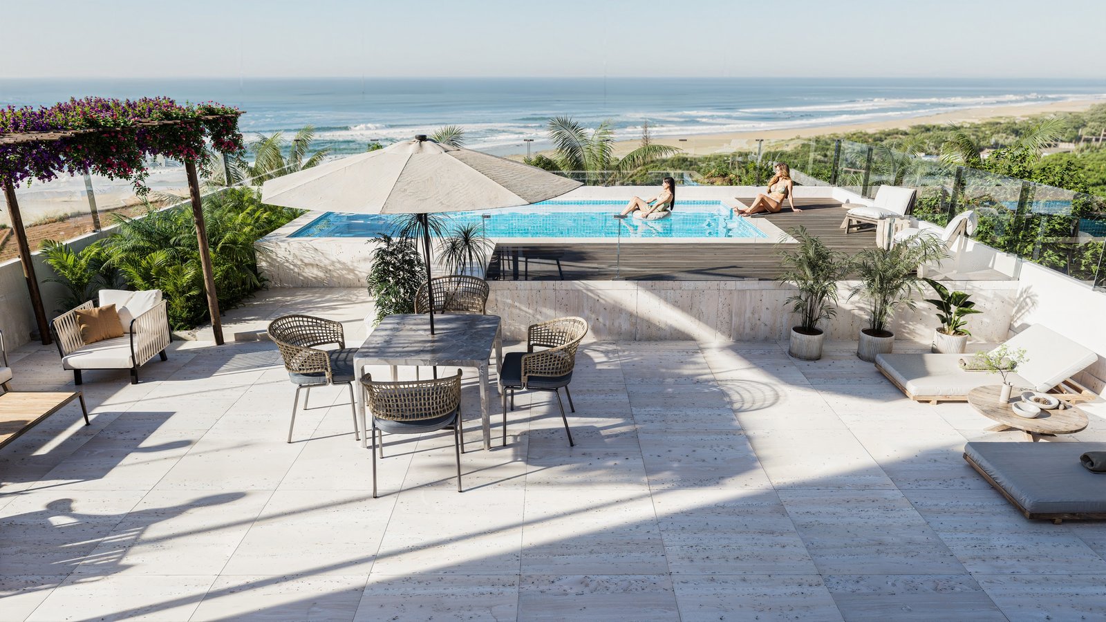 Terraza y piscina de Ocean Boutique con vista al mar